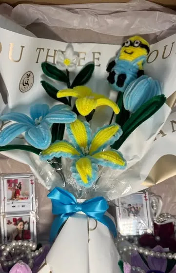Blue and yellow chenille lily bouquet in a PR box with photo frames